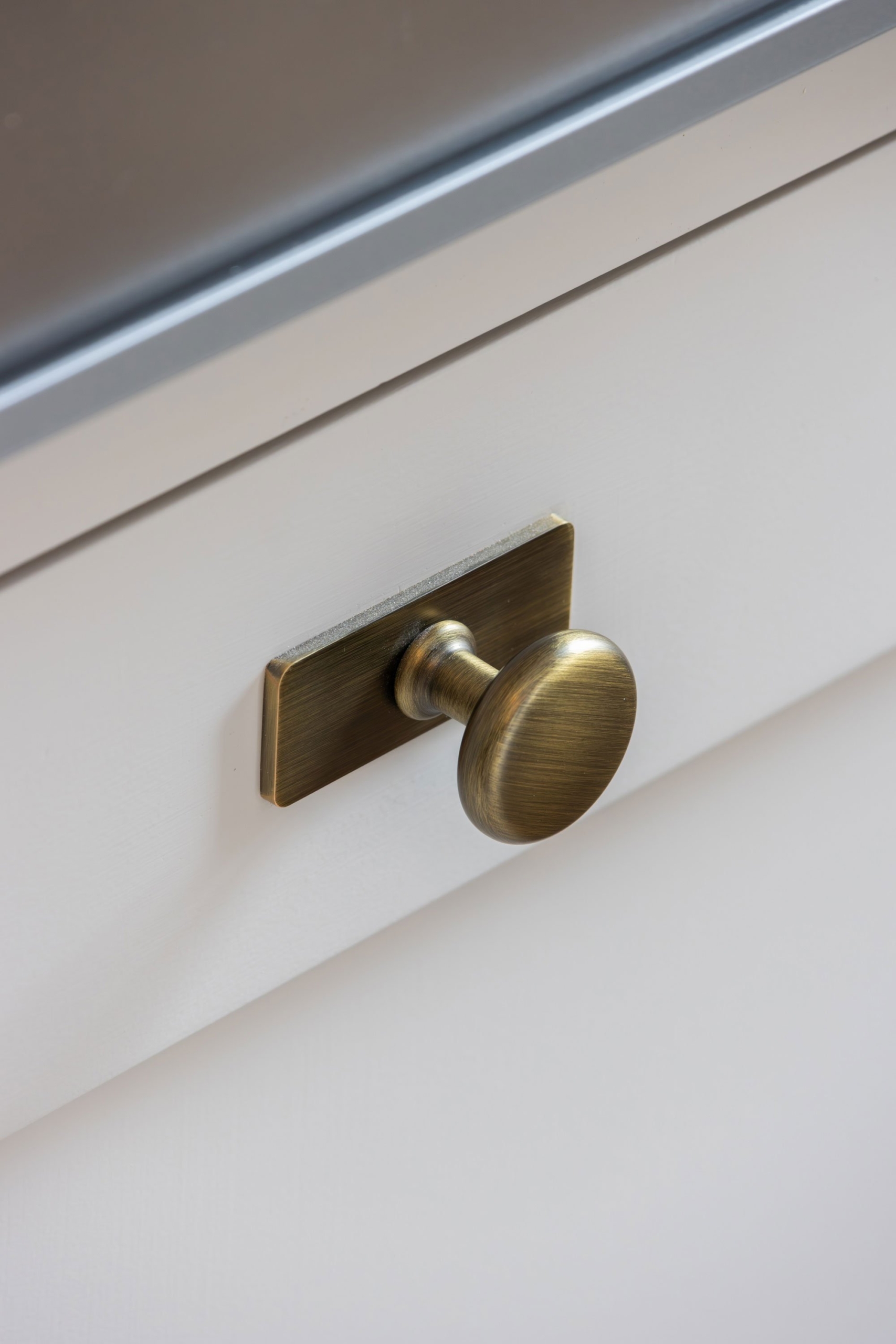 A Crofts & Assinder drawer handle